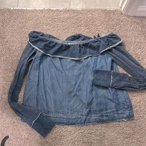 Off the shoulder denim blend shirt.